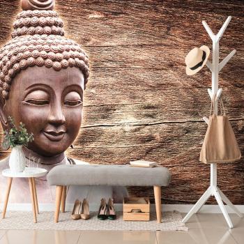Tapeta Posąg Buddy na drewnianym tle - 300x200