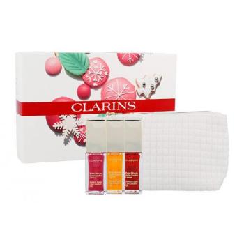 Clarins Instant Light Lip Comfort Oil Trio zestaw Lip care 7ml + Lip care 7ml 02 Raspberry +  Lip care 7ml 03 Cherry + Cosmetic bag W 01 Honey