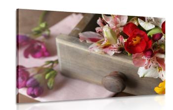 Obraz wiosenna kompozycja kwiatowa w drewnianej szufladzie - 90x60