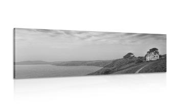 Obraz dom na klifie w wersji czarno-białej