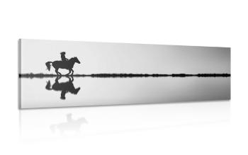 Obraz jeździec na koniu w wersji czarno-białej - 135x45