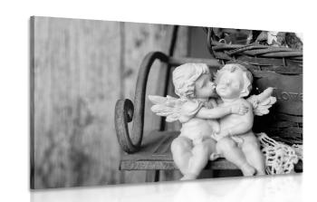 Obraz figurki aniołów na ławce w wersji czarno-białej - 120x80