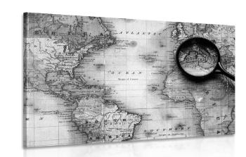 Obraz czarno-biała mapa świata z lupą