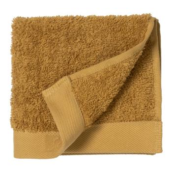 Żółty ręcznik z bawełny frotte Södahl Golden, 30x30 cm